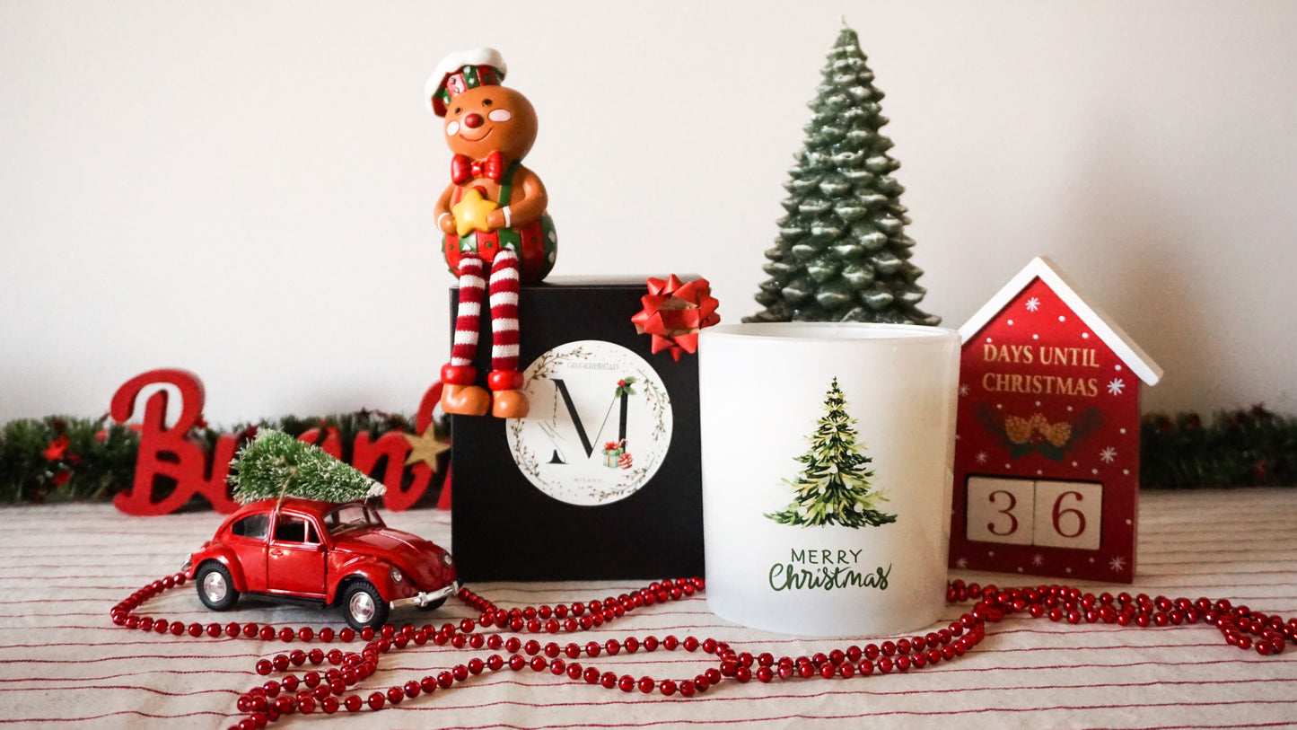 Candela di Natale a forma di albero di pan di zenzero