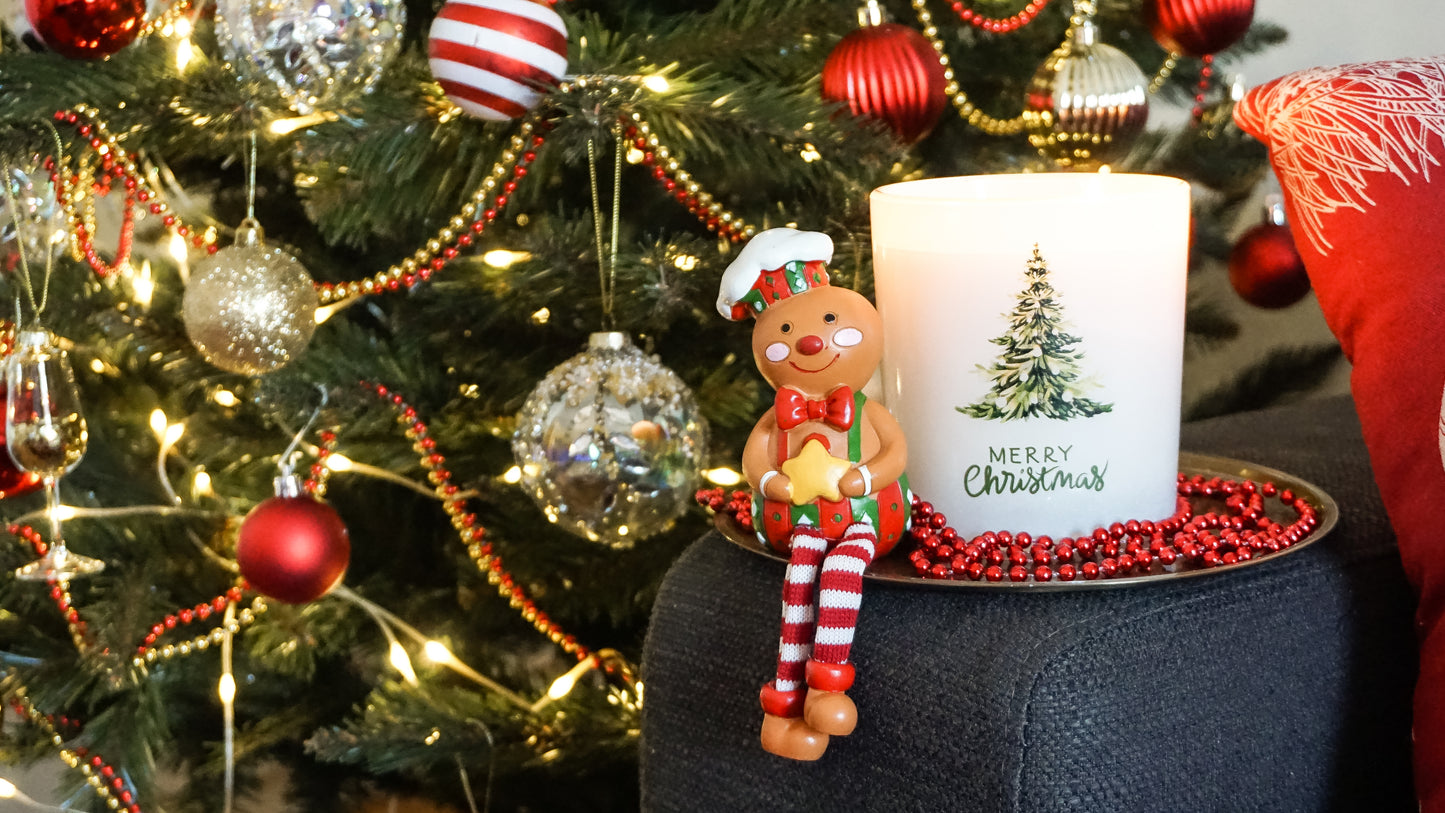 Candela di Natale a forma di albero di pan di zenzero